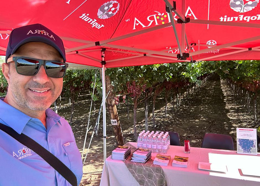Smiling Georgios Bitsakos at the ARRA display